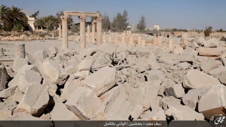 An image distributed by Islamic State militants on social media on August 25, 2015 purports to show the destruction of a Roman-era temple in the ancient Syrian city of Palmyra. REUTERS/Social Media