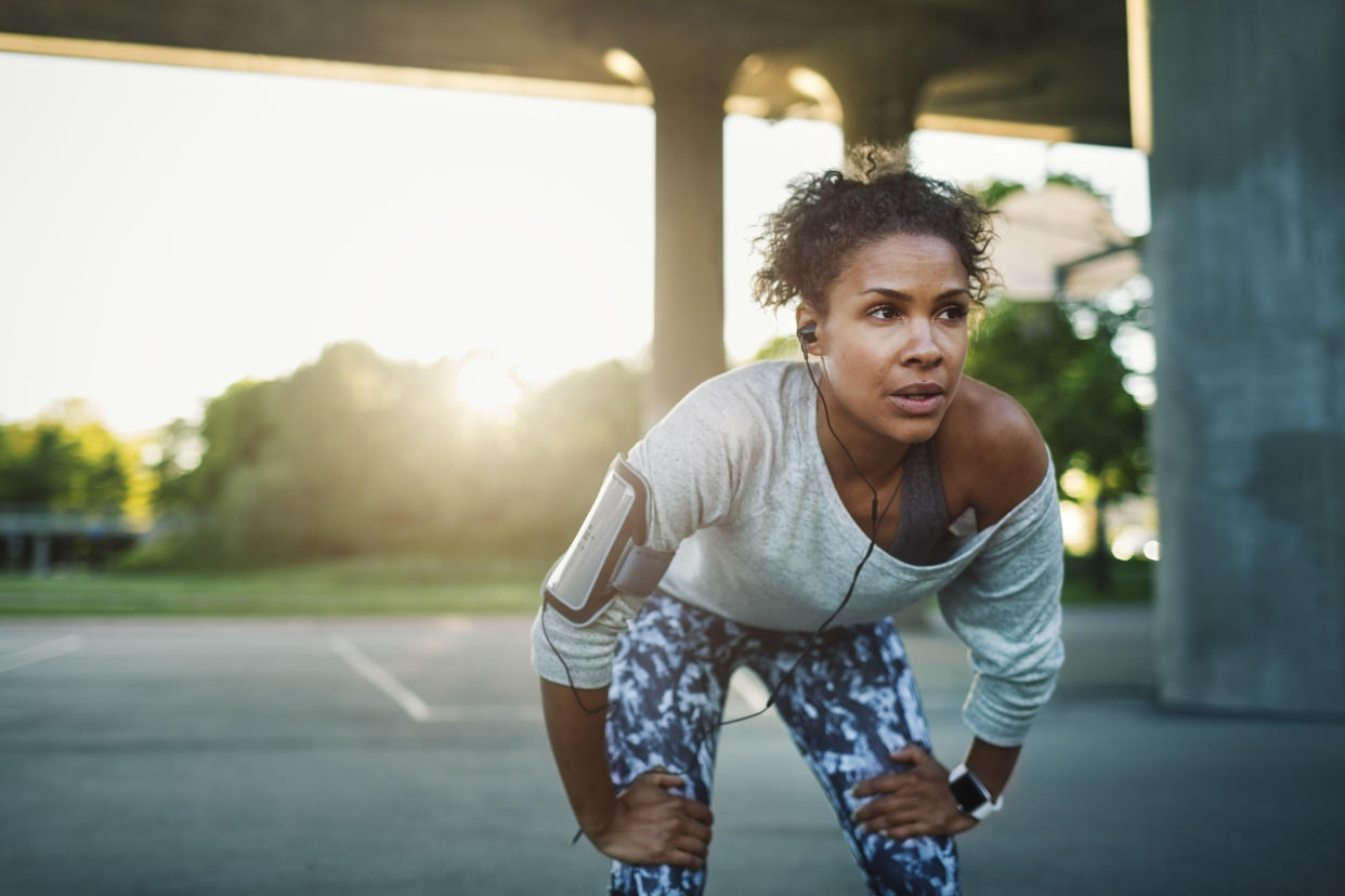 Music may make working out more comfortable. (Maskot / Getty Images)