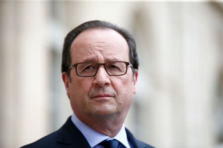 French President Francois Hollande visits an exhibition during a ceremony marking the first anniversary of the energy transition law, at the Elysee Palace in Paris, France, July 22, 2016. REUTERS/Thibault Camus/Pool