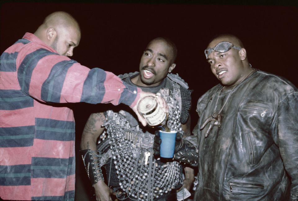 Suge Knight, Tupac Shakur, and rapper and Dr. Dre, 1995. (Credit: Nitro via Getty Images)