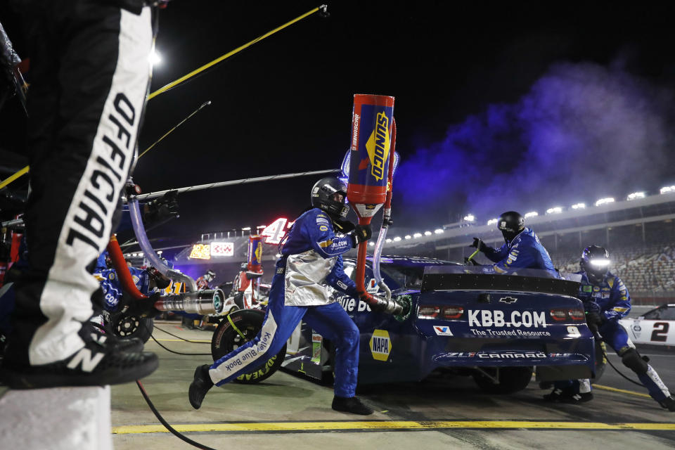 Chase Elliott makes a pit stop during a NASCAR Cup Series auto race at Charlotte Motor Speedway Thursday, May 28, 2020, in Concord, N.C. (AP Photo/Gerry Broome)