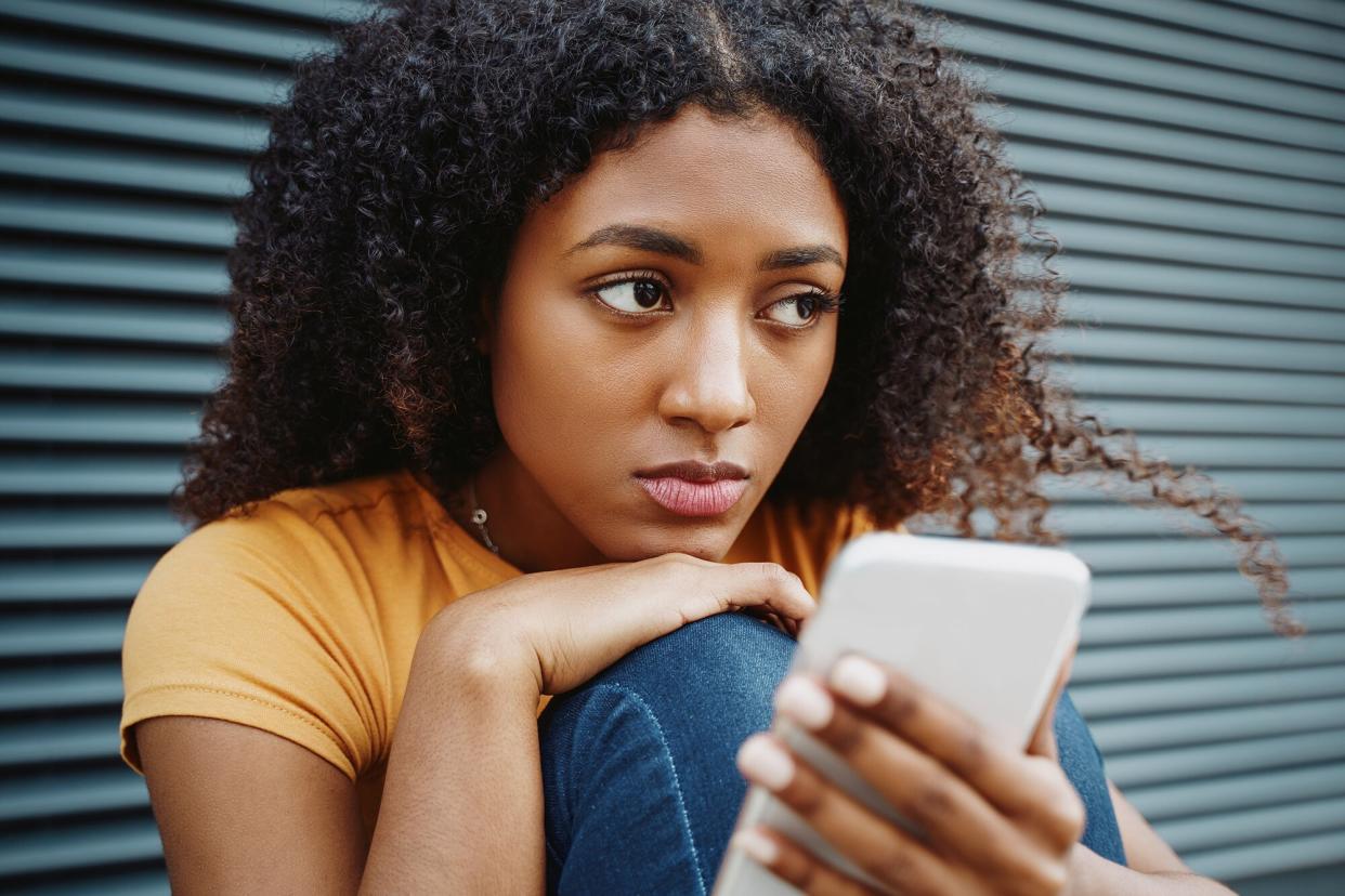 Woman Looking at Phone