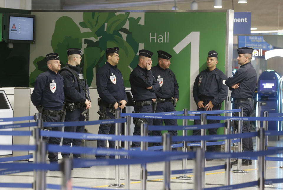 Police take position at Terminal 1 at Charles de Gaulle Airport, after an EgyptAir flight disappeared from radar during its flight from Paris to Cairo, in Paris, May 19, 2016. (Reuters/Christian Hartmann)
