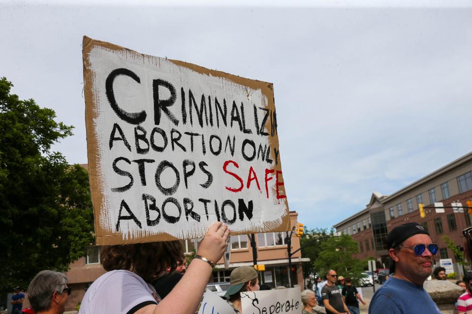 More than 100 people gathered at the Tippecanoe County Courthouse in Lafayette, Ind., June 24, 2022, hours after the U.S. Supreme Court ruled 6-3 to overturn Roe v. Wade, the landmark decision that gave a woman the right to an abortion 50 years ago.