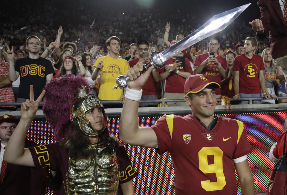 Southern California quarterback Kedon Slovis (9) celebrates after a 45-20 win over Stanford during an NCAA college football game Saturday, Sept. 7, 2019, in Los Angeles. (AP Photo/Marcio Jose Sanchez)