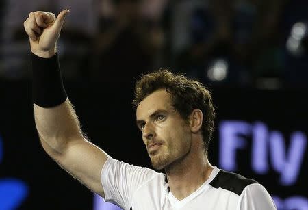 Britain's Andy Murray celebrates after winning his quarter-final match against Spain's David Ferrer at the Australian Open tennis tournament at Melbourne Park, Australia, January 27, 2016. REUTERS/Tyrone Siu