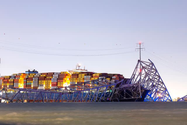 <p>JIM LO SCALZO/EPA-EFE/Shutterstock</p> Baltimore bridge collapses after being hit by container ship.