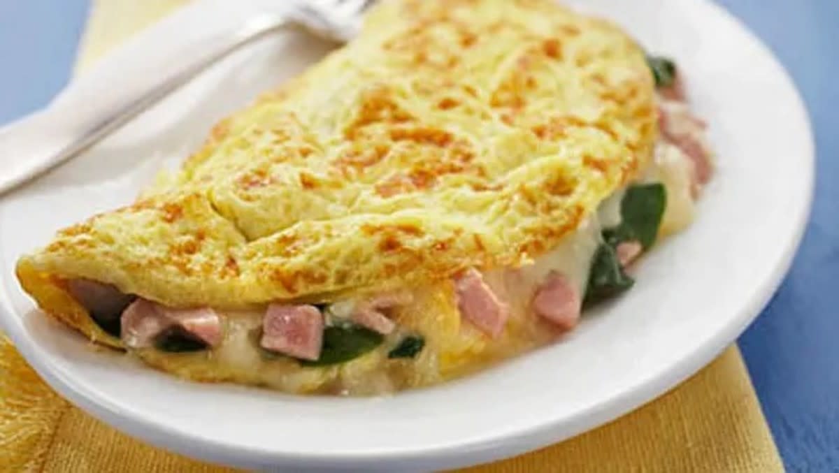 <p>Parade</p><p>Omelets are a great way to use up whatever you have in the fridge.</p><p><strong>Get the recipe: <a href="https://parade.com/30529/parade/spinach-ham-and-cheese-omelet/" rel="nofollow noopener" target="_blank" data-ylk="slk:Spinach Ham and Cheese Omelet;elm:context_link;itc:0;sec:content-canvas" class="link rapid-noclick-resp">Spinach Ham and Cheese Omelet</a></strong></p>
