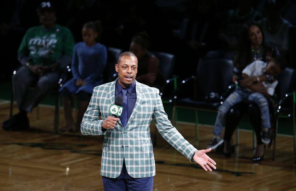 Former Boston Celtics Paul Pierce address the crowd during a ceremony to retire his number following an NBA basketball game against the Cleveland Cavaliers in Boston, Sunday, Feb. 11, 2018. (AP Photo/Michael Dwyer)