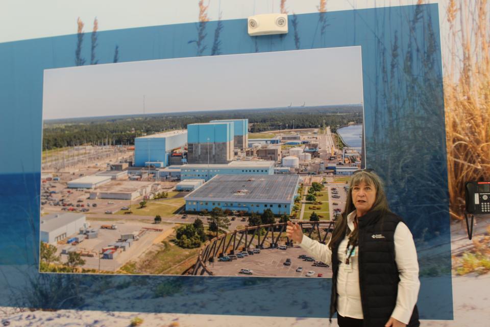 Karen Williams points out various features of the Brunswick Nuclear Plant during a tour of the Brunswick Energy and Education Center on Thursday, January 10, 2024.