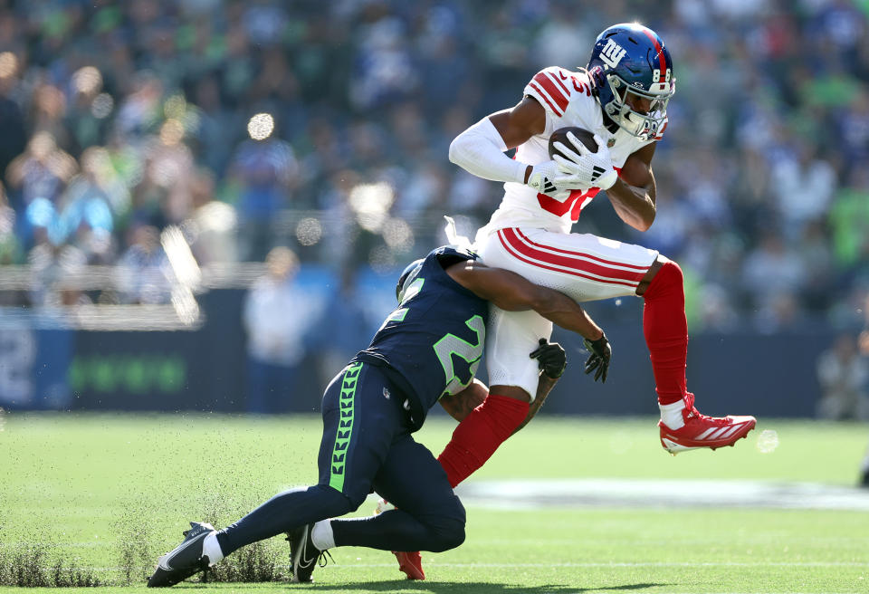 Darius Slayton outstretched his arms and pointed his fingers downfield after making a catch on Sunday afternoon against the Seahawks