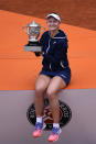 Czech Republic's Barbora Krejcikova poses with the cup after defeating Russia's Anastasia Pavlyuchenkova in their final match of the French Open tennis tournament at the Roland Garros stadium Saturday, June 12, 2021 in Paris. The unseeded Czech player defeated Anastasia Pavlyuchenkova 6-1, 2-6, 6-4 in the final. (AP Photo/Christophe Ena)