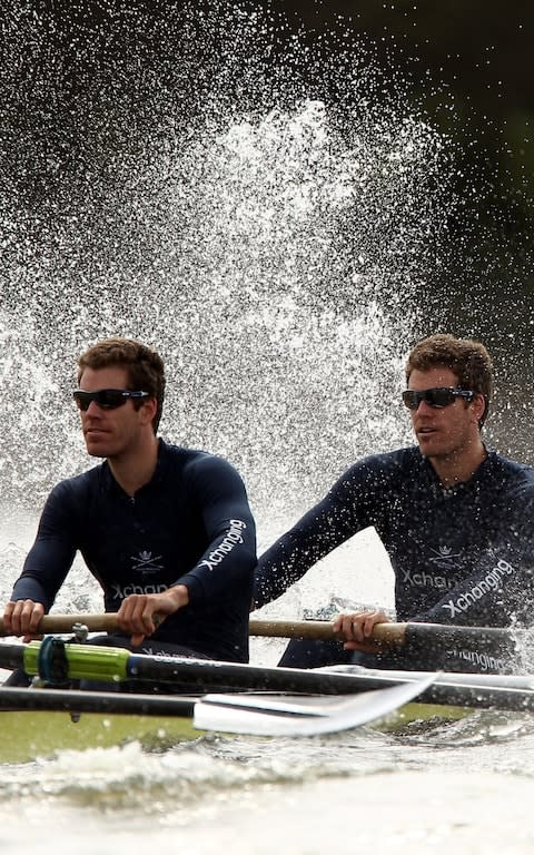 Cameron (left) and Tyler (right) train on the River Thames ahead of the Xchanging University Boat Race on March 30, 2010 - Credit: Getty