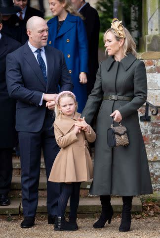 <p>Mark Cuthbert/UK Press via Getty</p> Mike Tindall, Lena Tindall with Zara Tindall on Christmas 2023