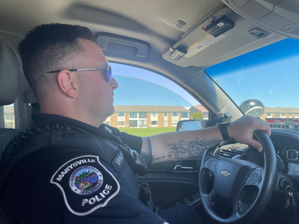 Marysville school resource officer TJ Williams driving his patrol car on May 2, 2024.