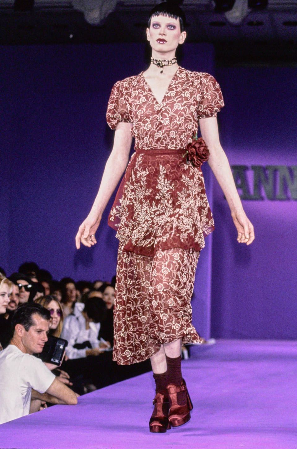 Kristen McMenamy wears a perfect Anna Sui dress.