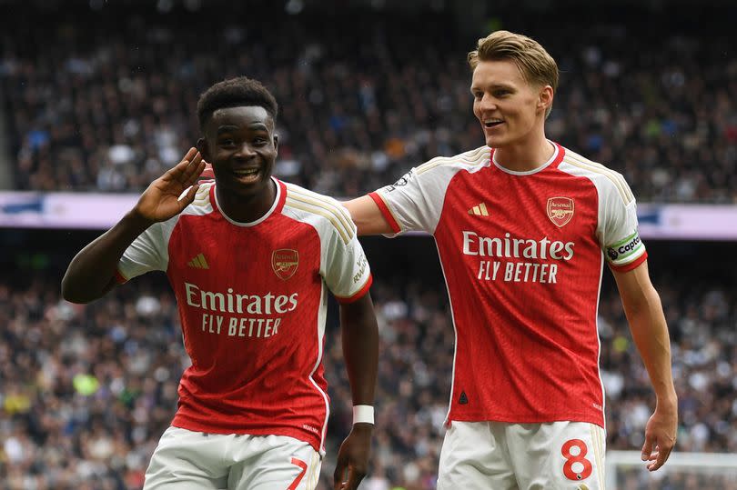 Bukayo Saka celebrates the first Arsenal goal with (R) Martin Odegaard -Credit:Arsenal FC via Getty Images