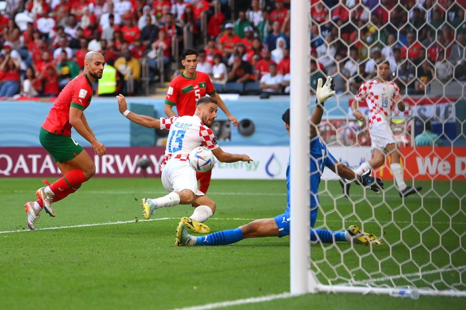 Yassine Bounou of Morocco saves a shot by Nikola Vlasic of Croatia (Getty Images)