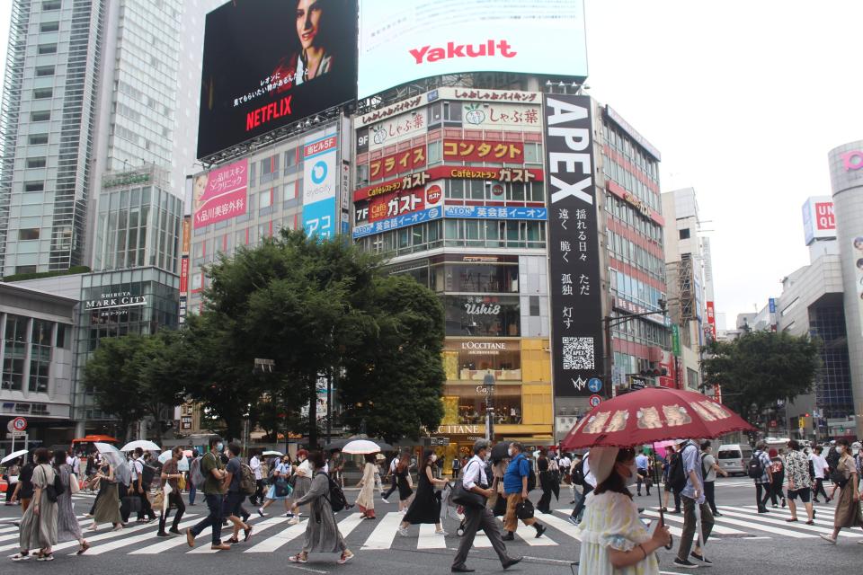 Crowds at the famous Shibuya Crossing outside the train station.