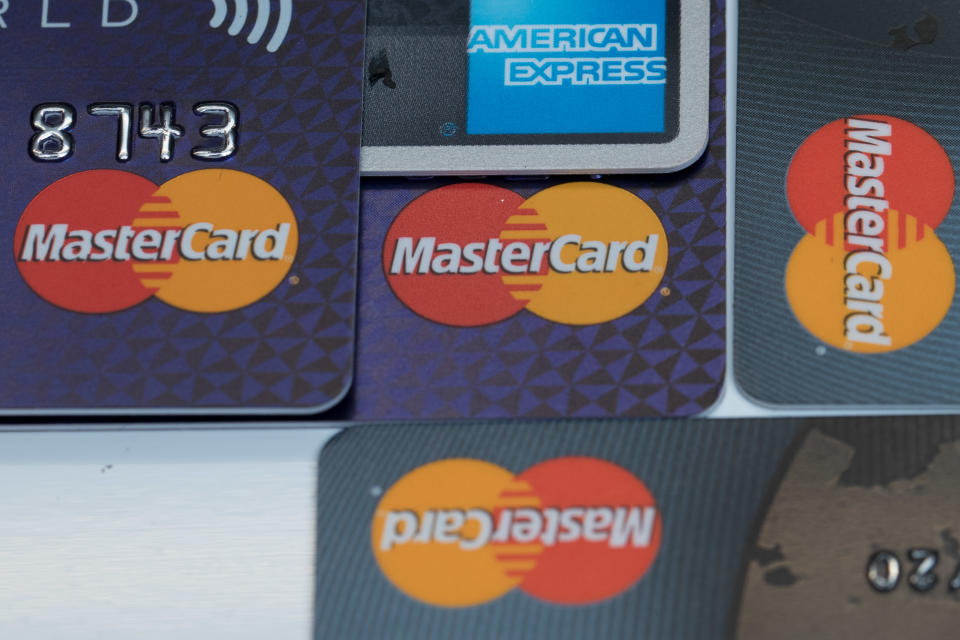 Debts on credit cards can quickly grow to become a problem. Getty Images