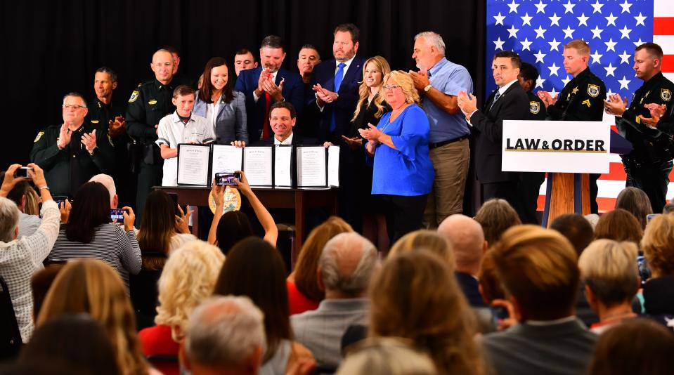 Gov. Ron DeSantis was in Titusville May 1 with Florida Attorney General Ashley Moody at the American Police Hall of Fame and Museum to sign three bills.