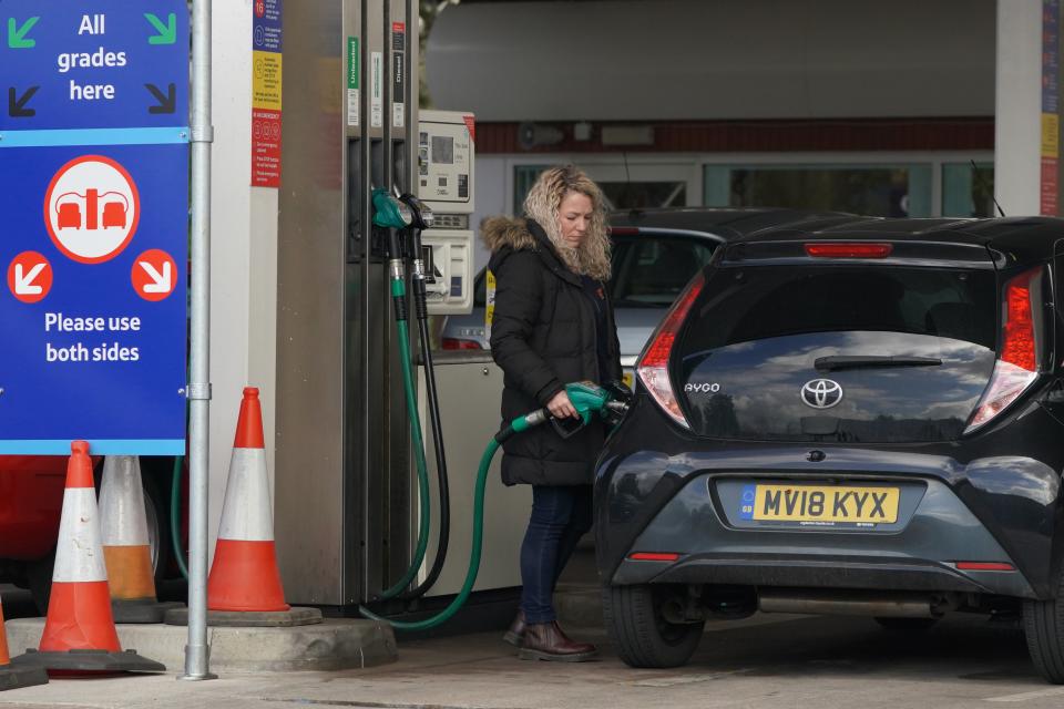 inflation  A woman fills up a vehicle at a petrol station in Manchester, Britain, on April 13, 2022. Britain's Consumer Prices Index CPI rose by 7 percent in the 12 months to March 2022, up from 6.2 percent in February, hitting a new 30-year high, official statistics showed Wednesday. (Photo by Jon Super/Xinhua via Getty Images)