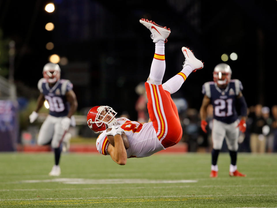<p>Kansas City Chiefs tight end Travis Kelce (87) is upended after making a catch during the fourth quarter against the New England Patriots at Gillette Stadium. Mandatory Credit: David Butler II-USA TODAY Sports </p>
