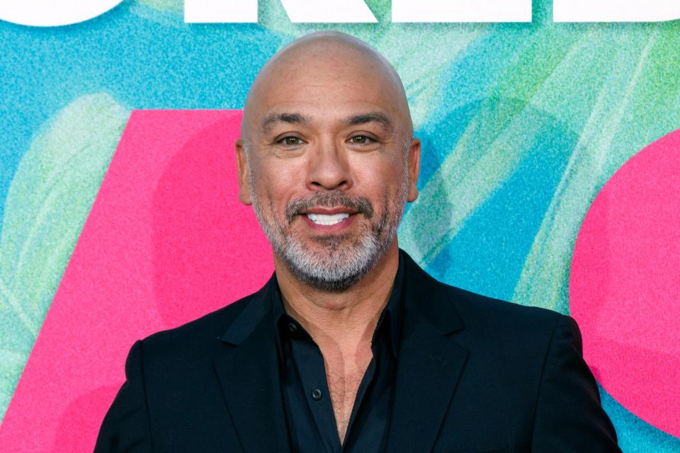 Jo Koy, seen on the red carpet at the premiere of his 2022 movie "Easter Sunday," is hosting the 81st Golden Globes.
