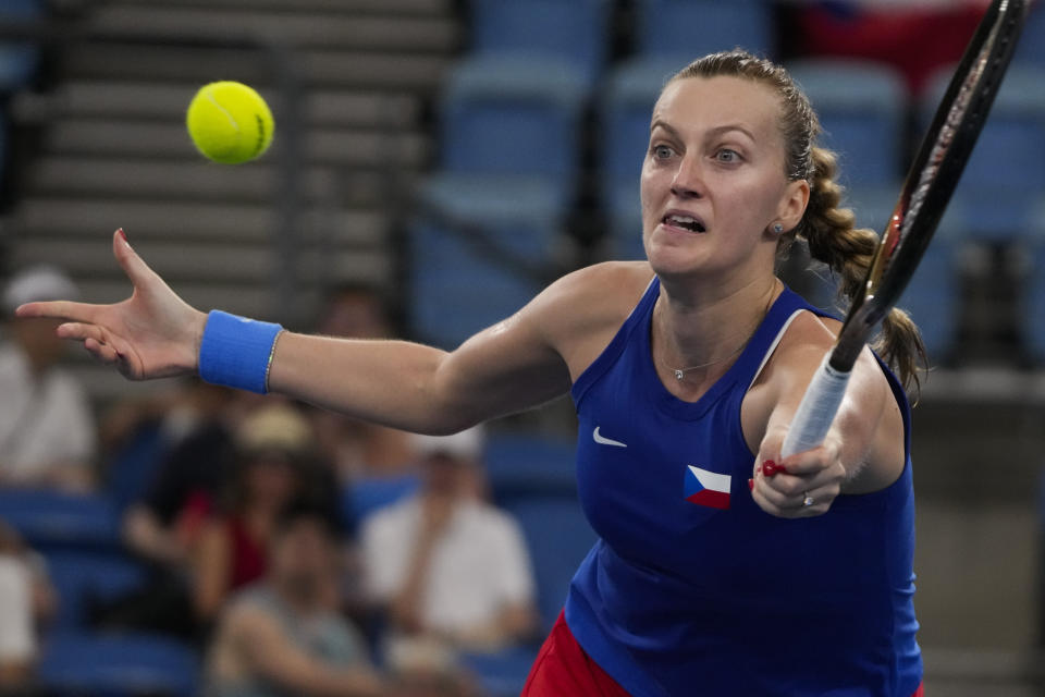Petra Kvitova of the Czech Republic plays a forehand return to Germany's Laura Siegemund during their Group C match at the United Cup tennis event in Sydney, Australia, Sunday, Jan. 1, 2023. (AP Photo/Mark Baker)