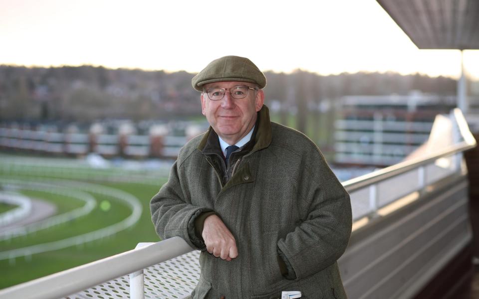 BBC Radio 5 racing commentator Cornelius Lysaght photographed in the press box at Newbury racecourse - JOHN LAWRENCE