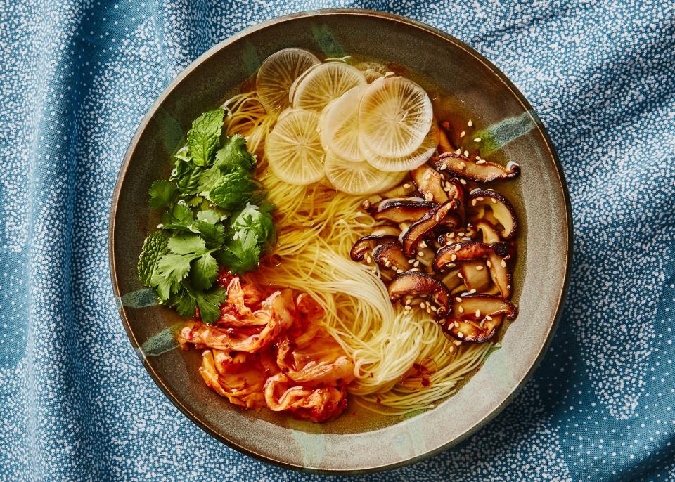 Alison Carroll, who developed this recipe, relies almost entirely on dry pantry staples to build depth of flavor in this superfood broth. Feel free to swap out the vermicelli for your favorite cooked grain or a different noodle—the recipe is designed to be customizable. <a rel="nofollow noopener" href="https://www.bonappetit.com/recipe/brothy-noodle-bowl-with-mushrooms-and-chiles?mbid=synd_yahoo_rss" target="_blank" data-ylk="slk:See recipe.;elm:context_link;itc:0;sec:content-canvas" class="link ">See recipe.</a>