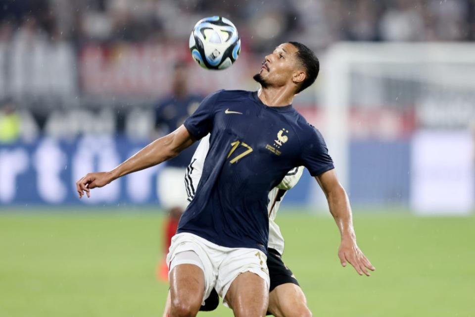 DORTMUND, GERMANY - SEPTEMBER 12: William Saliba of France runs with the ball during the international friendly match between Germany and France at Signal Iduna Park on September 12, 2023 in Dortmund, Germany. (Photo by Christof Koepsel/Getty Images)