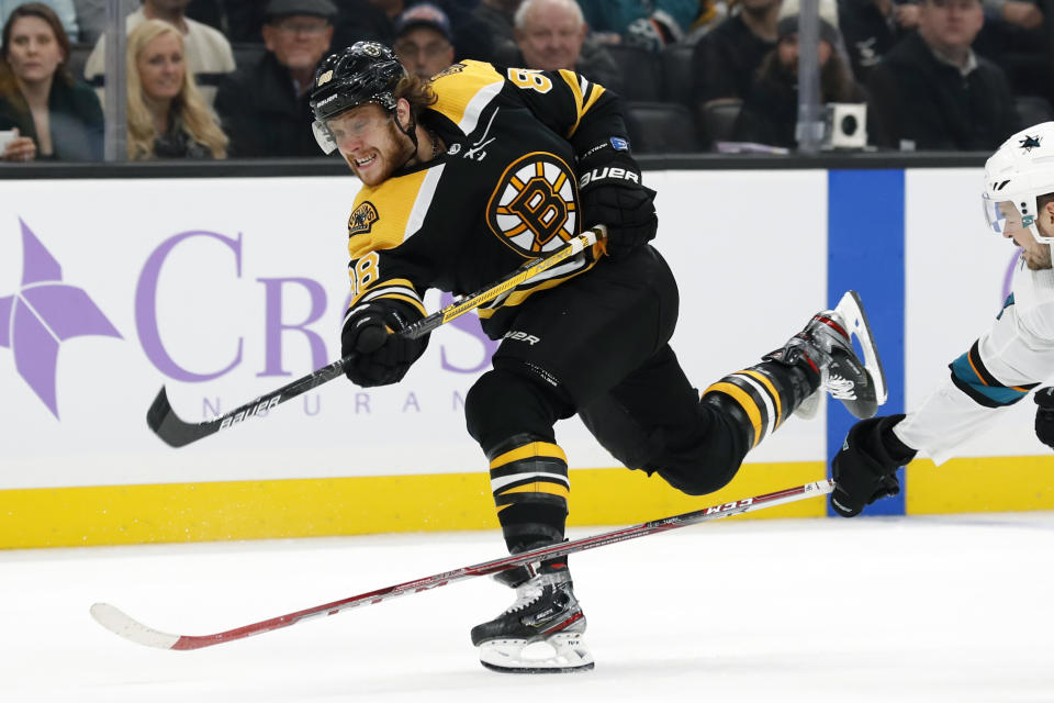 FILE - In this Oct. 29, 2019, file photo, Boston Bruins' David Pastrnak shoots during the second period of an NHL hockey game against the San Jose Sharks in Boston. Washington's Alex Ovechkin and Boston's David Pastrnak share the Maurice “Rocket” Richard Trophy the league announced Thursday, May 28, 2020. (AP Photo/Winslow Townson, File)