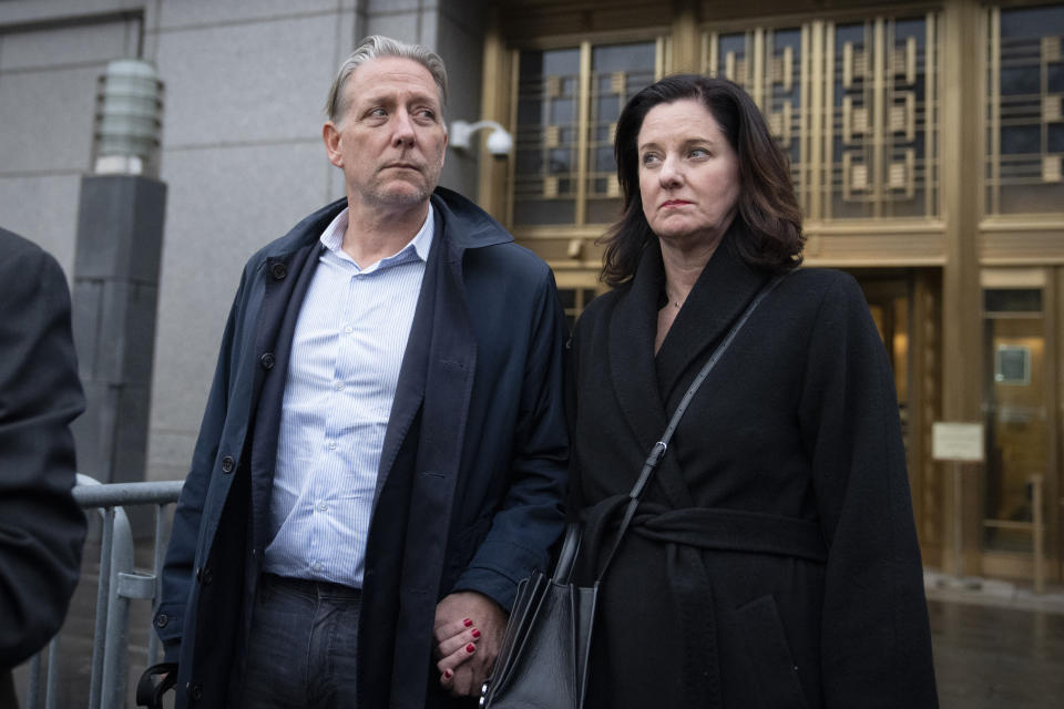 Charles McGonigal, left, former special agent in charge of the FBI's counterintelligence division in New York, leaves court, Monday, Jan. 23, 2023, in New York. The former high-ranking FBI counterintelligence official has been indicted on charges he helped a Russian oligarch, in violation of U.S. sanctions. (AP Photo/John Minchillo)