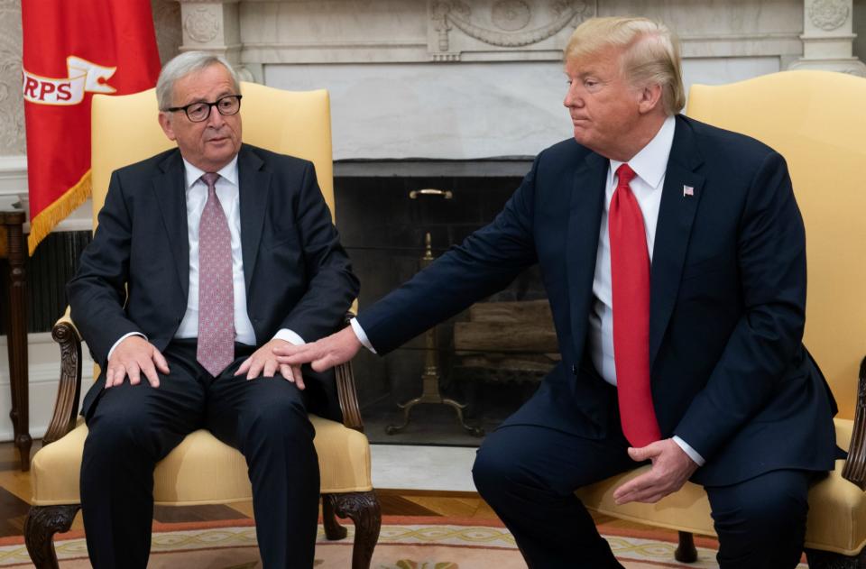 During an earlier briefing, Donald Trump also made the gesture of placing his hand on Jean-Claude Juncker’s leg. Source: Getty