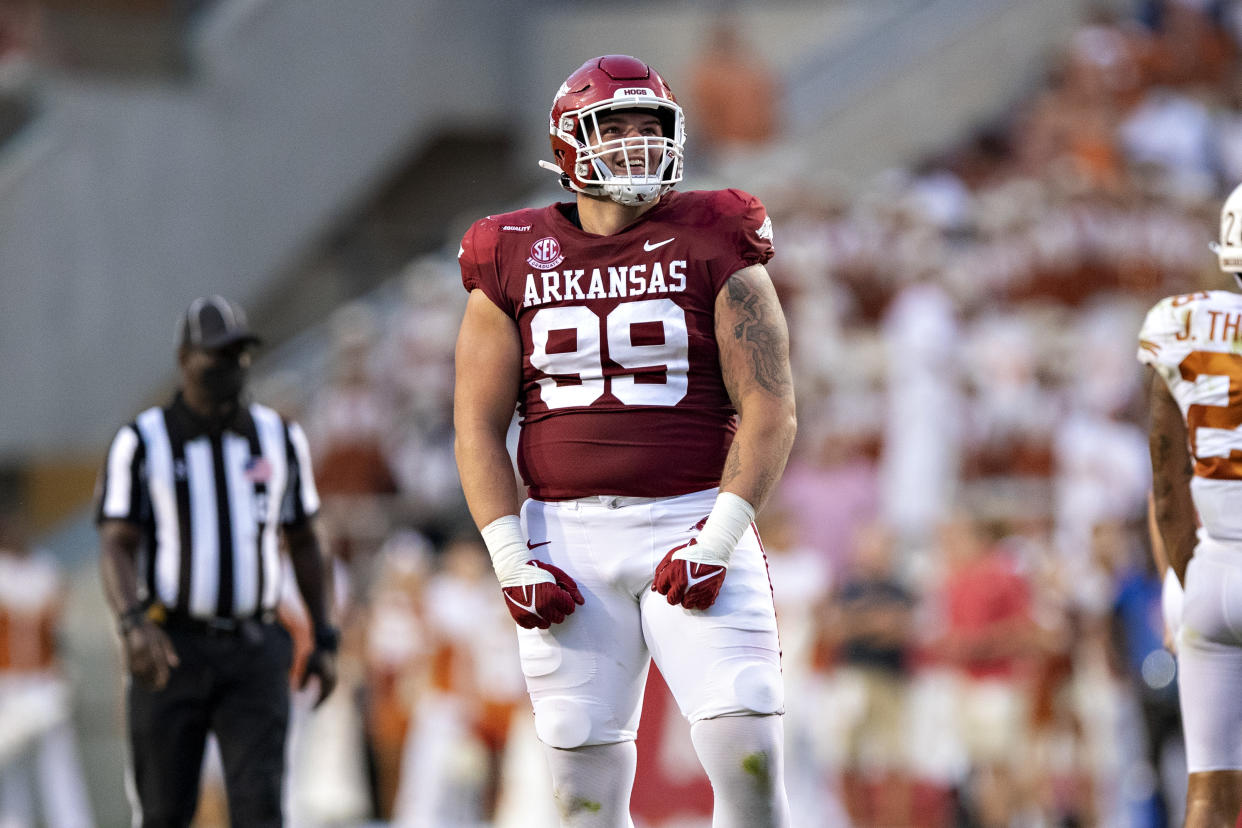 Arkansas DL John Ridgeway (#99) notched a sack and six tackles against Texas just two weeks after an appendectomy. (Photo by Wesley Hitt/Getty Images)