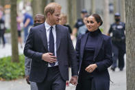 Meghan Markle and Prince Harry leave the National September 11 Memorial & Museum in New York, Thursday, Sept. 23, 2021. (AP Photo/Seth Wenig)