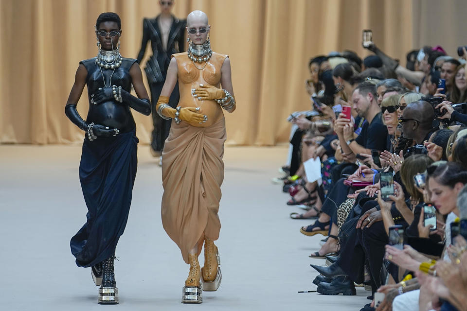 Models wear creations as part of Jean Paul Gaultier's Haute Couture Fall/Winter 2022-2023 fashion collection presented Wednesday, July 6, 2022 in Paris. (AP Photo/Michel Euler)