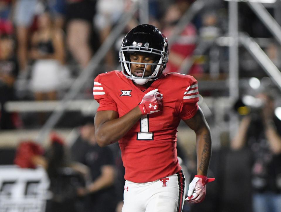 Texas Tech receiver Myles Price (1) celebrates a touchdown in the Red Raiders' 41-3 home victory on Sept. 16 against Tarleton State. Price is expected to have his name entered into the NCAA transfer portal, according to a report Tuesday.