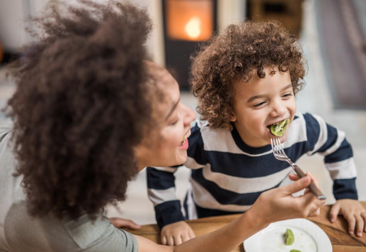 Everyone agrees kids should eat healthy foods. But parents are often left out of that message. <a href="https://www.gettyimages.com/detail/photo/african-american-mother-feeding-her-happy-son-with-royalty-free-image/1126065782?phrase=parent%20feeding%20child" rel="nofollow noopener" target="_blank" data-ylk="slk:skynesher/E+ via Getty Images;elm:context_link;itc:0;sec:content-canvas" class="link ">skynesher/E+ via Getty Images</a>