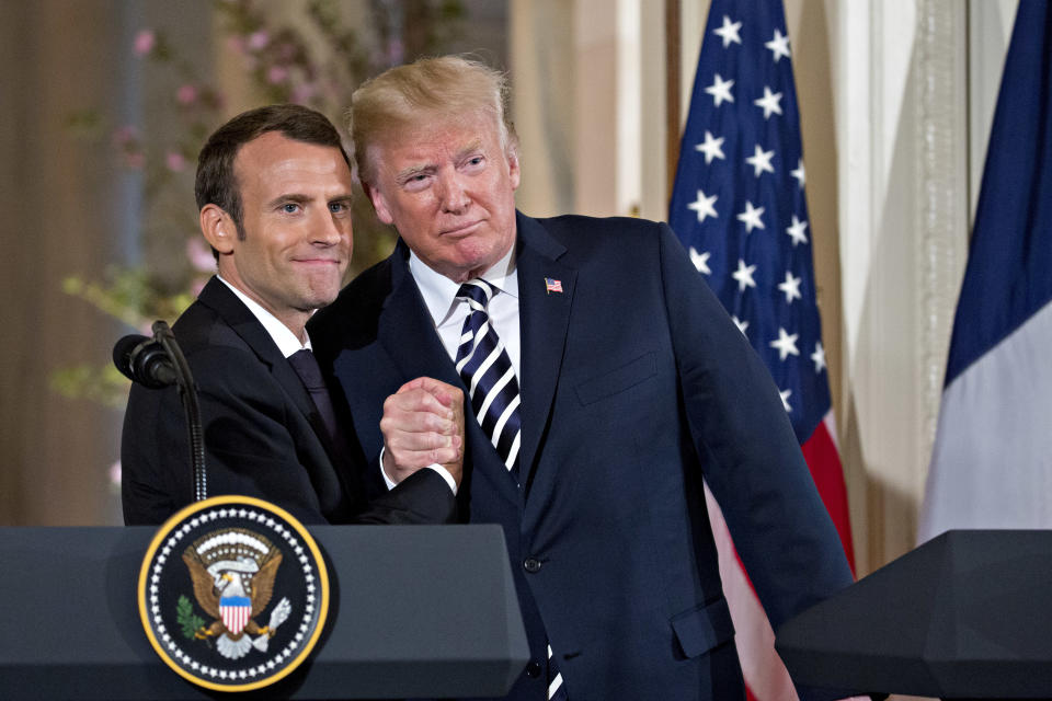 U.S. President Donald Trump embraces French President Emmanuel Macron during a news conference in the White House, April 24, 2018. (Photo: Bloomberg via Getty Images)