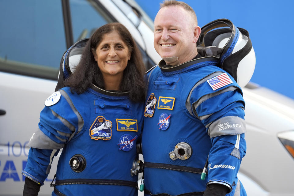 FILE - NASA astronauts Suni Williams, left, and Butch Wilmore stand together for a photo enroute to the launch pad at Space Launch Complex 41 Wednesday, June 5, 2024, in Cape Canaveral, Fla., for their liftoff on the Boeing Starliner capsule to the international space station. (AP Photo/Chris O'Meara, File)