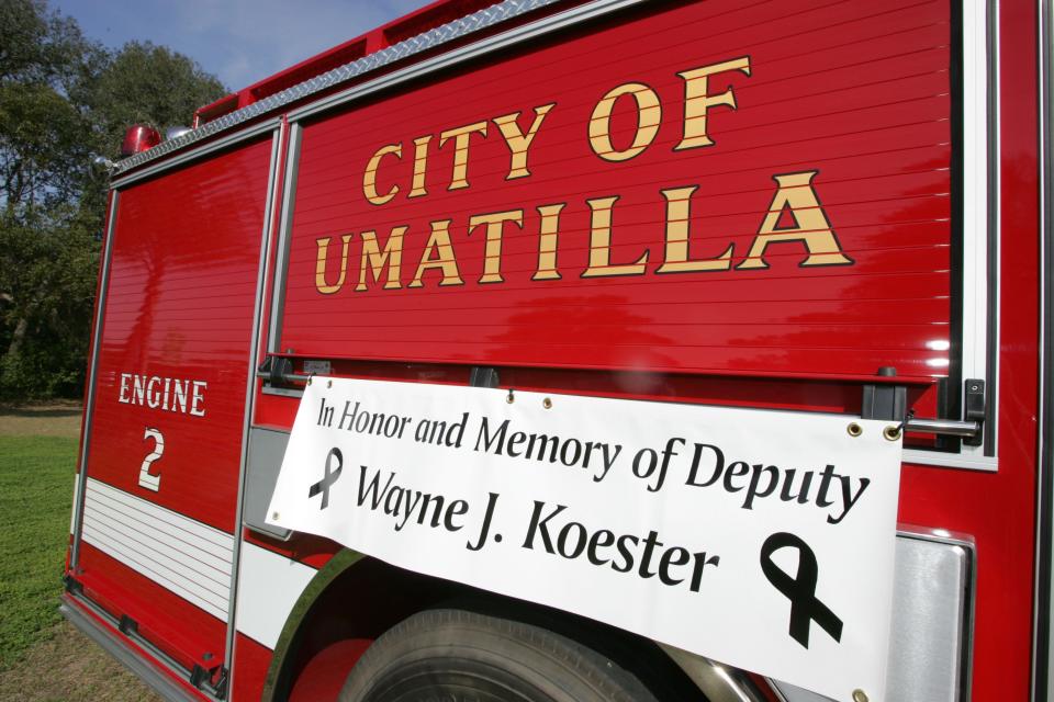 A City of Umatilla Fire Rescue truck displays a banner honoring Lake County Sheriff's Deputy Wayne Koester during his funeral at the First Baptist Church of Eustis in Eustis, Fla. on Wednesday, Feb. 16, 2005. Koester was shot and killed by Jason Lee Wheeler on Wednesday, Feb. 9, 2005.