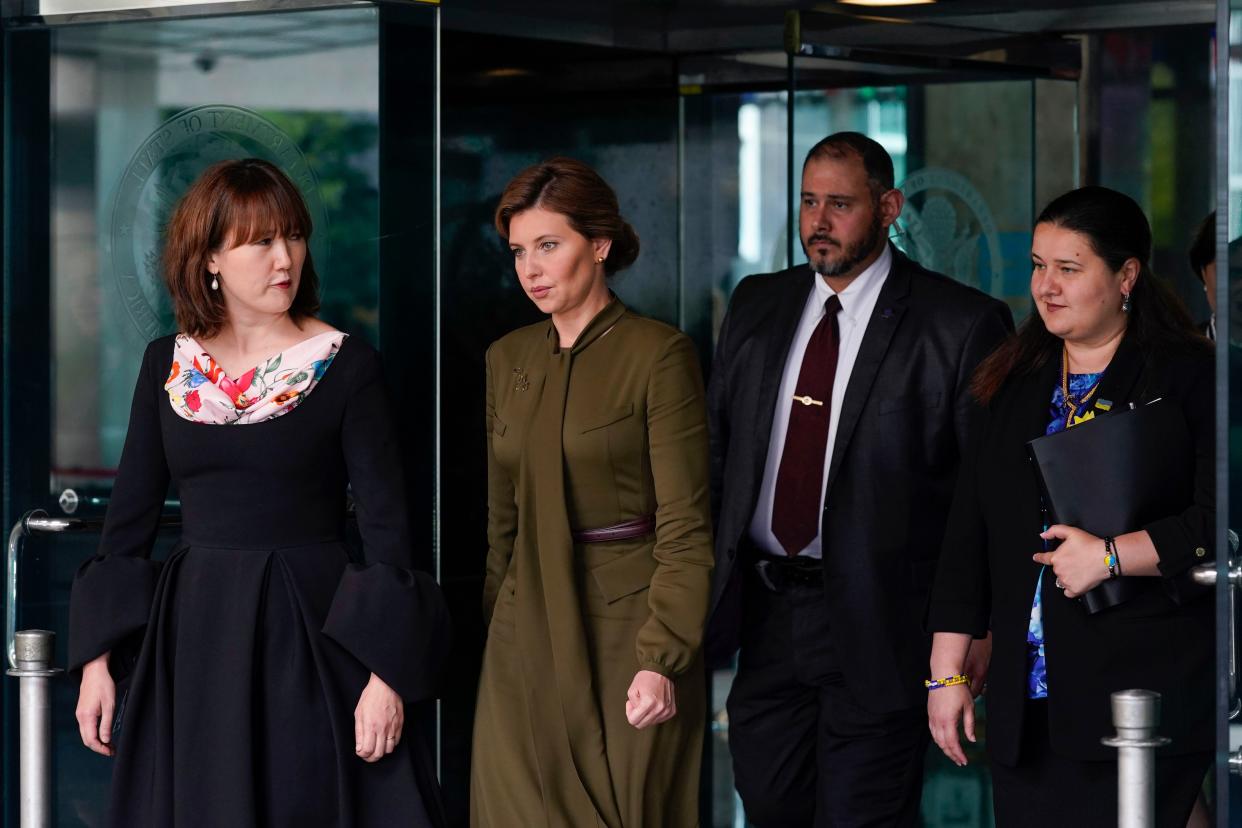 Olena Zelenska, second from left, spouse of Ukrainian's President Volodymyr Zelenskyy, walks out of the State Department, Monday, July 18, 2022 in Washington, after meeting with Secretary of State Antony Blinken in a closed-to-press meeting. Walking at right is Ukraine's Ambassador to the United States, Oksana Markarova. 