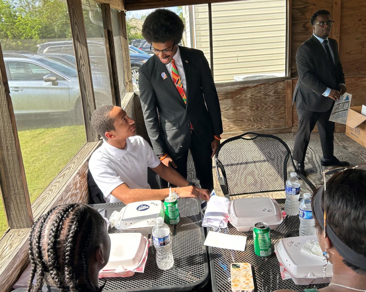 Tennessee state Rep. Justin Pearson greets Virginia State University students Sept. 5, 2024, at Ettrick Deli across River Road from VSU.