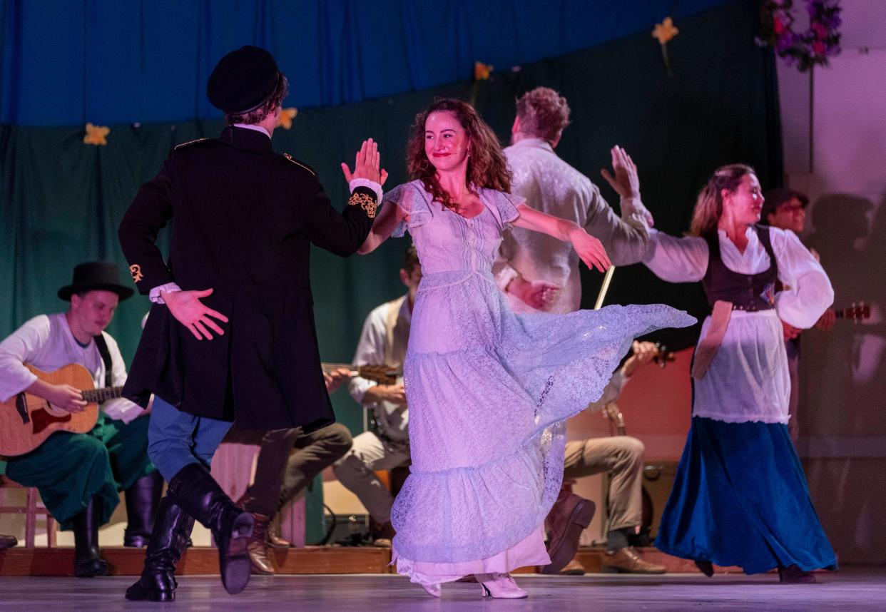 Actress Shalia Sakona dancing with cast in the Palm Beach Shakespeare Festival’s romantic comedy "Twelfth Night" at Commons Park in Royal Palm Beach, Florida on August 26, 2021.