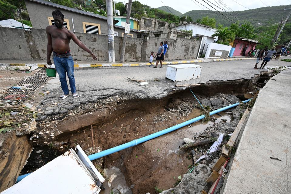 颶風貝麗爾侵襲牙買加，帶來強風豪雨致災。（AFP）