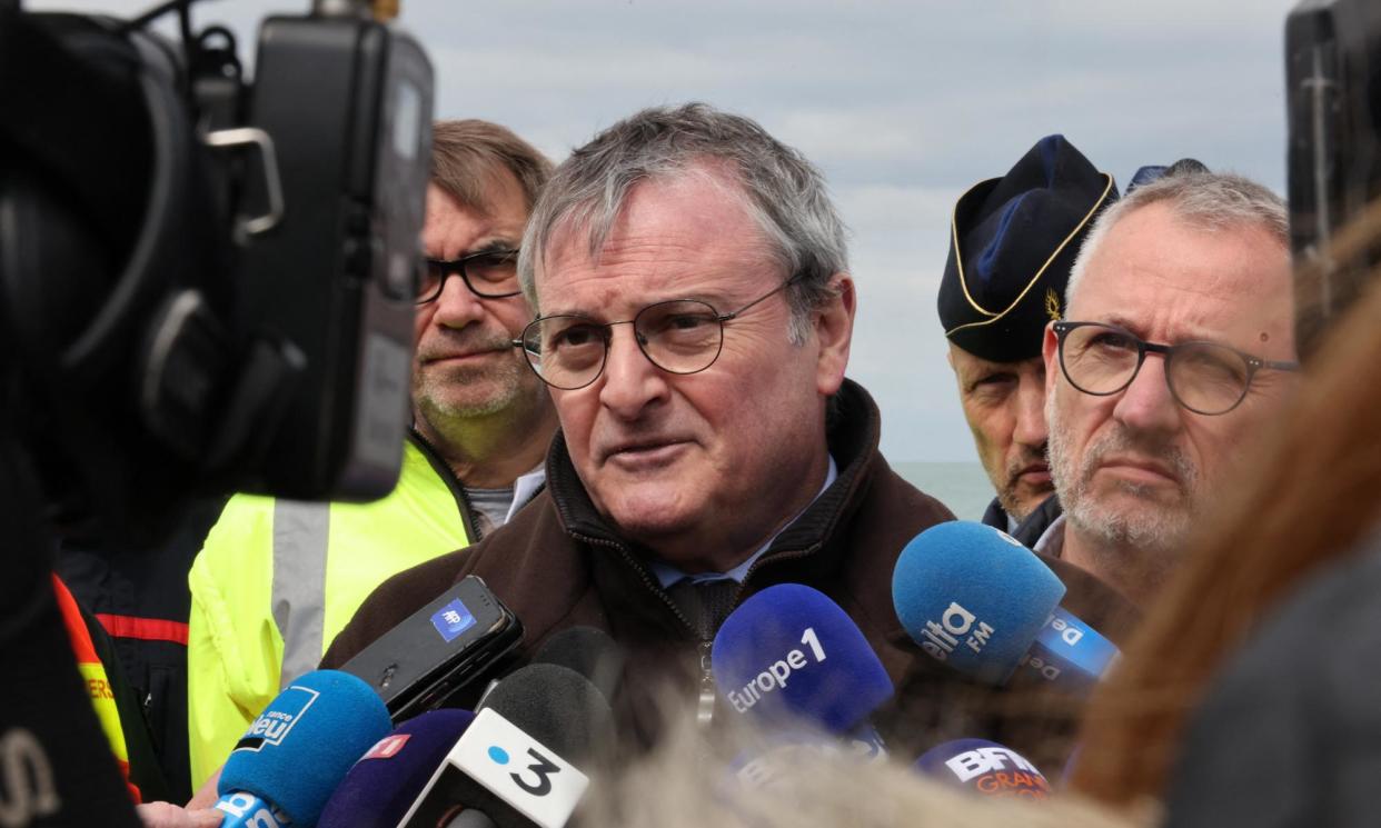 <span>The prefect of Pas-de-Calais, Jacques Billant, updates reporters on the incident.</span><span>Photograph: Denis Charlet/AFP/Getty Images</span>