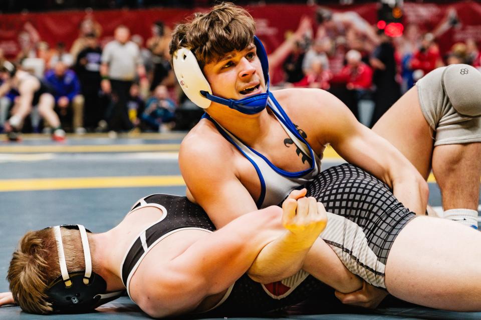 Tusky Valley's T.J. Wilson, bottom, wrestles Tuslaw's Jacob Lyons during day two of the Ohio High School Athletic Association 2024 State Wrestling Championships, Saturday, March 9 at The Ohio State University Jerome Schottenstein Center, in Columbus.