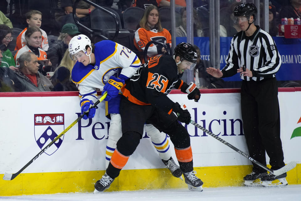 Buffalo Sabres' Tage Thompson (72) collides with Philadelphia Flyers' James van Riemsdyk (25) during the second period of an NHL hockey game, Friday, March 17, 2023, in Philadelphia. (AP Photo/Matt Slocum)